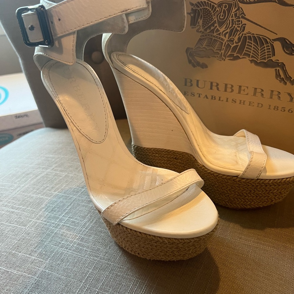 White vintage Bally sandals. I'm a size 7 and they fit perfectly.